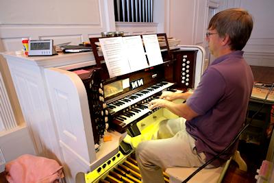 Music Director Jed Holland playing
